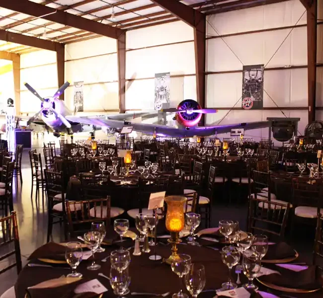 Wedding ceremony at hangar at Yanks Air Museum