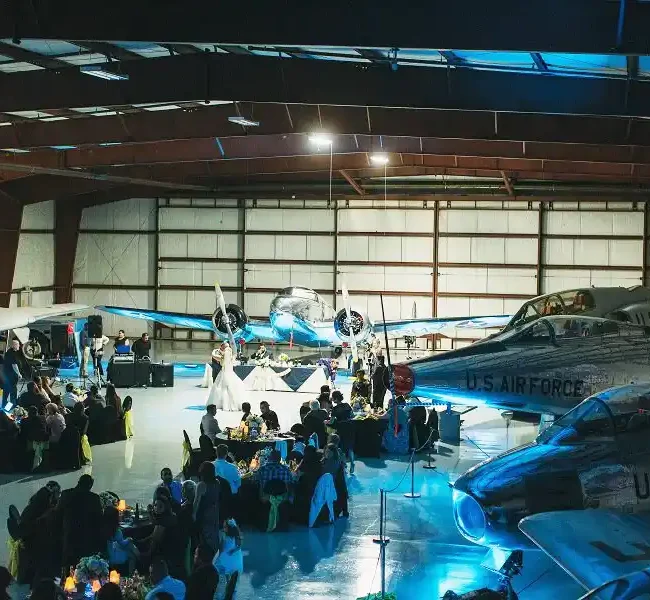 Wedding ceremony at hangar at Yanks Air Museum