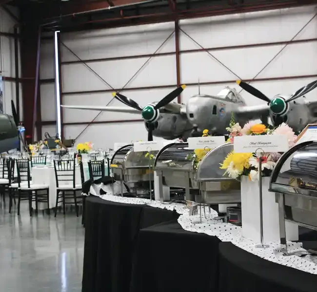 Wedding ceremony at hangar at Yanks Air Museum