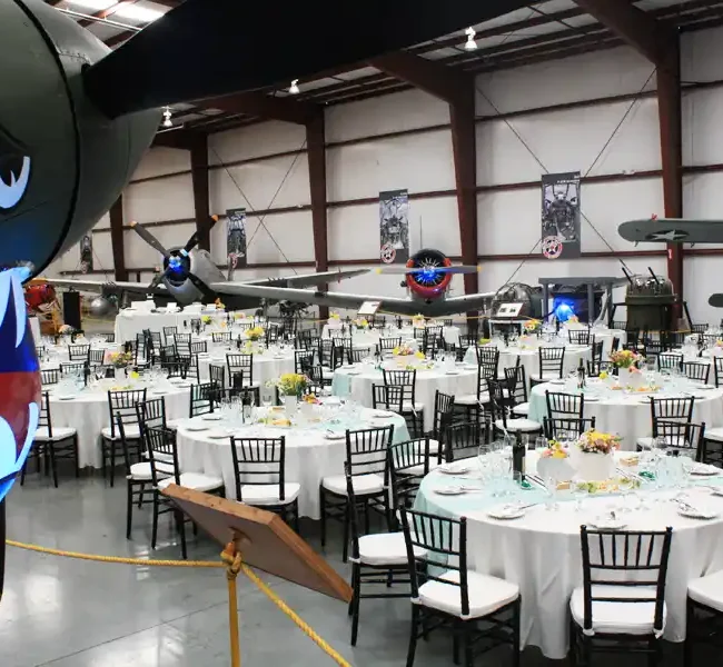 Wedding ceremony at hangar at Yanks Air Museum